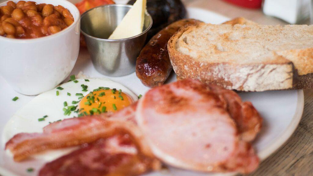 a full english breakfast with eggs, bacon and sausage
